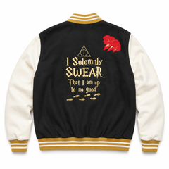 Back view of black cream and gold wizard-themed varsity jacket