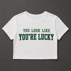 White cropped baby tee with green You Look Like You're Lucky design